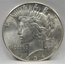 1934-D Peace Dollar Nch Unc Coin AF619 - £150.83 GBP
