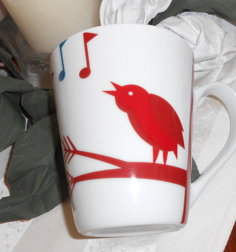Primary image for * Starbucks Coffee Company 2012 Red Bird Singing Music Musical Notes Cup Mug