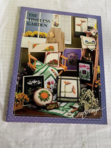 The Timeless Garden cross stitch design book with iron on transfer - $11.40