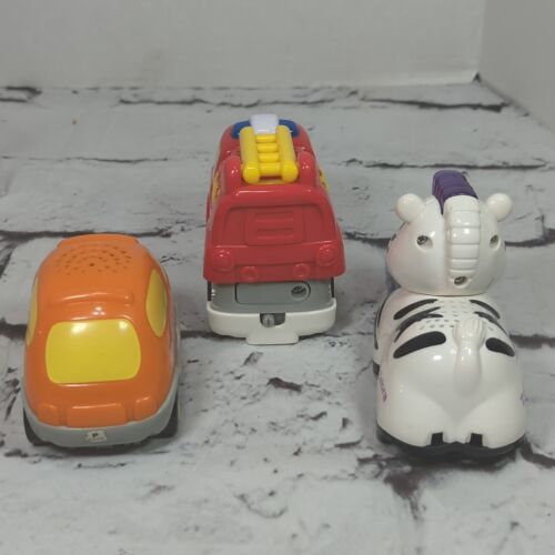Primary image for VTech Cars and Animal Lot of 3 Firetruck Van Zebra 