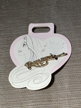 Rapunzel hair pin - $217.77 MXN