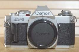 Iconic Canon AV1 (body only). Lovely condition. Fantastic Beginner Camera. - £114.10 GBP