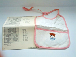 Vintage cross stitch pink trim  baby bib partially finished with pattern... - $27.12 CAD