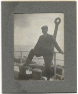 Turn of the century cabinet card man leaning on a ship railing near an a... - £15.81 GBP