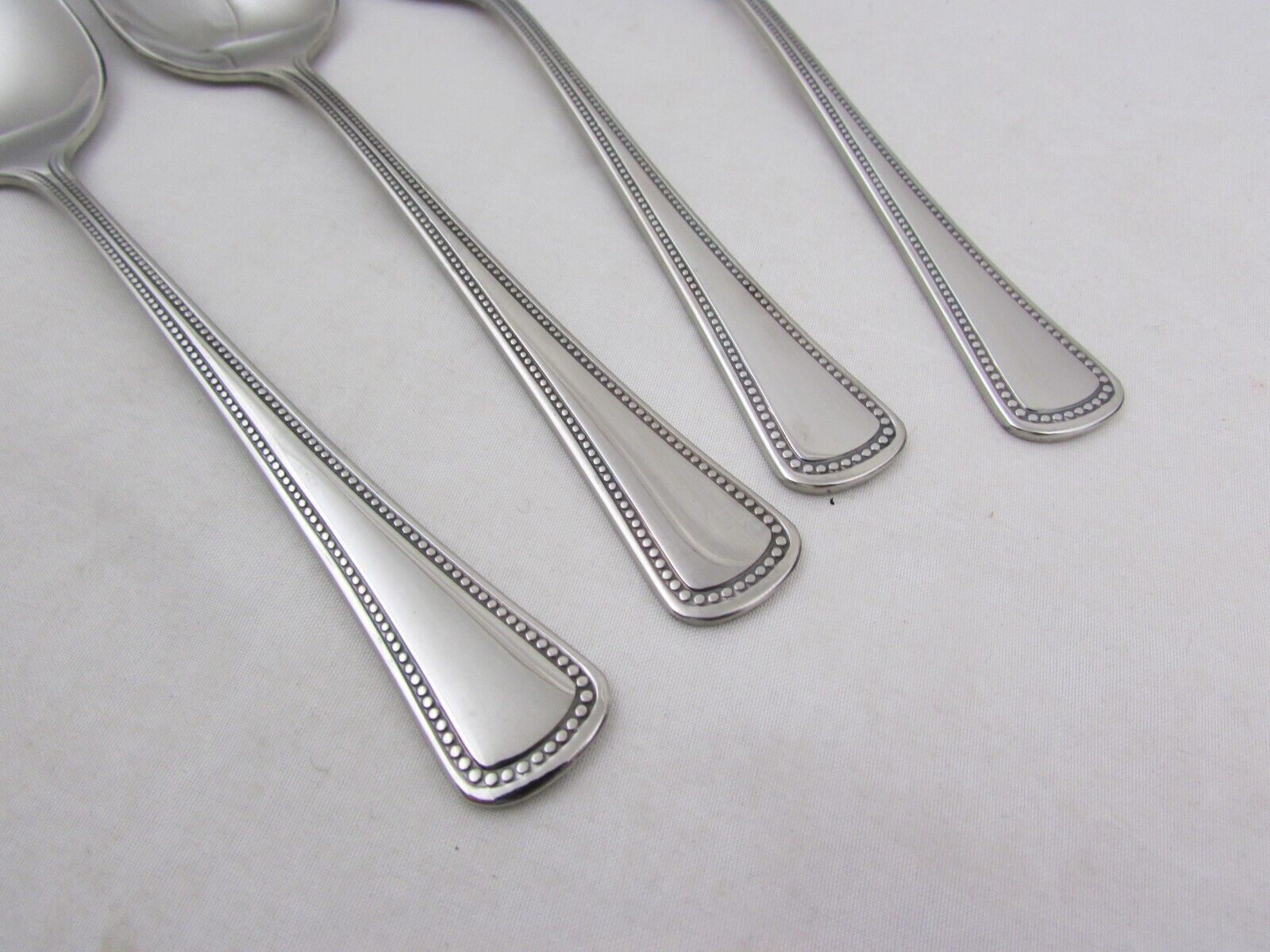 NEW 4 Oneida stainless steel teaspoons Needlepoint-Beaded Artistry 6" - £15.30 GBP