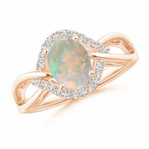 ANGARA Oval-Shaped Opal Entangled Split Shank Ring with Diamond Halo - £905.81 GBP