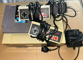 Nintendo Entertainment System NES-001 w/ControllerS Tested Power AS-IS R... - $742.52 MXN