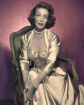Loretta Young stunning gold outfit beaded jewelry in chair 11x14 Photo - $14.99