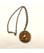 Vintage Gold Tone Texture wood Traveling Seal pendant necklace - $39.64 CAD
