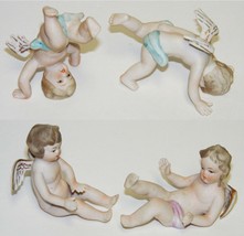 Vtg Baby Angels - 4 Bisque Figurines Japan Numbered - $25.00