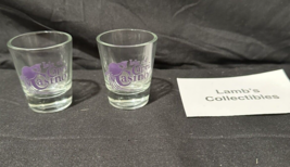 Isle of Capri Casino Bird Purple lettering 2.5&quot; Shot Glass nightcap souv... - £23.70 GBP