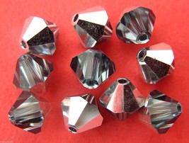 5 6mm Swarovski Crystal Bicones - Indian Sapphire CAL(Pls. read item descrip.) - £0.91 GBP