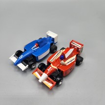 F1 HO Slot Car Lot of 2 Vtg Red #1 Blue #5 Castrol Goodyear Jacques Vill... - $29.02