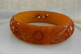 Bakelite amber bangle pierced bracelet carved flower vintage antique - £130.30 GBP