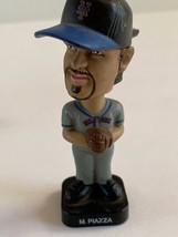 Two bobblehead , M.Piazza and all American Games - $6.64