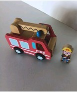 Wooden Fire Truck with 1 Firefighter Play Figure Red in Color - $218.24 MXN