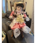 Vintage Porcelain Doll Brown Hair, Pink Dress And Rocking Chair - $25.00