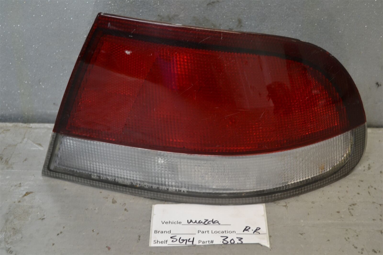 Primary image for 1993-1997 Mazda 626 Right Pass Genuine Oem tail light 03 5G4
