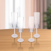 Set of Four Clear Acrylic Stemmed Flutes - $3,005.84 MXN