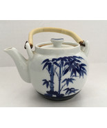 Vintage  decorative serving tea pot white with blue palm trees coated ha... - $19.75