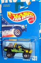 Hot Wheels Early 1990s Mainline #131 Nissan Hardbody Black w Yellow Inte... - $9.00