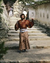 Richard Chamberlain in Japanese costume from Shogun walks down steps 8x10 photo - $10.99