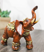 Feng Shui Faux Wood Right Facing Trunk Up Elephant With Golden Tapestry Figurine - £11.73 GBP