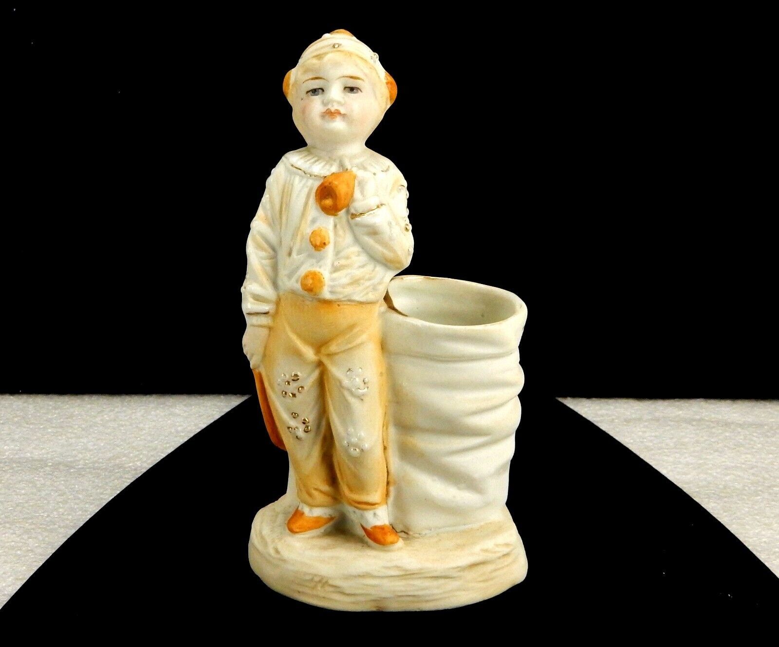 Primary image for Bisque Porcelain Figurine Match Holder, Costumed Clown Boy, Pale Orange & White