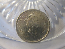 (FC-1380) 1999 Canada; 10 Cents { eccess metal on lettering } - $17.00