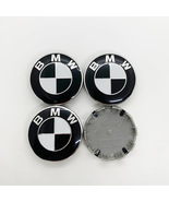 4x BMW 68mm black white wheel center cover wheel badges emblem  - €15,77 EUR