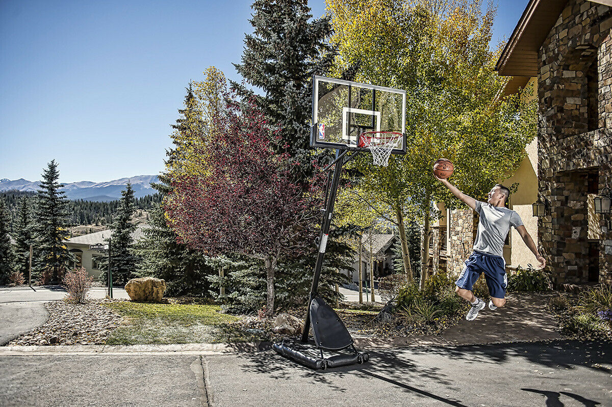 Spalding NBA 54" Portable Angled Basketball Hoop with Polycarbonate Backboard - $227.70