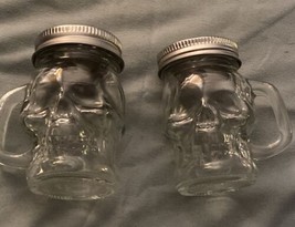 Salt &amp; Pepper Shakers Skull Skulls Head  Clear Glass 3” H X 2” Diameter New - $8.55