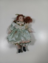 6 inch porcelain baby with green satin dress very cute vintage - £3.96 GBP