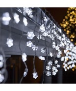 New 70 Cool White LED Snowflake twinkle Icicle  Lights White Wire  11.8 ft. - $31.67