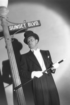 William Holden in Sunset Blvd. Boulevard top hat posing by Sign 18x24 Poster - $23.99