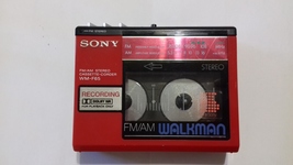 Sony Walkman WM-F65 Red For repair or parts (probably needs belt) - $130.00
