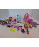 Lot of Polly Pockets outfits dolls accessories See Pics Incomplete - $147.12 MXN