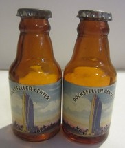 Vintage  Twin Towers Rockefeller center Salt/pepper shakers bottle shape - £64.35 GBP
