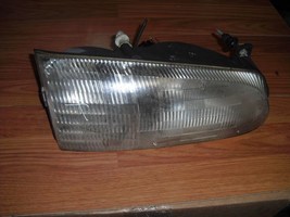 Front Right Headlight Silver OEM 1995 1996 1997 Ford Windstar 90 Day War... - $10.64