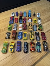 Lot of 30+ 1:64 Scale Cars Hot Wheels Matchbox Superman Fisher Price Sha... - $462.37 MXN