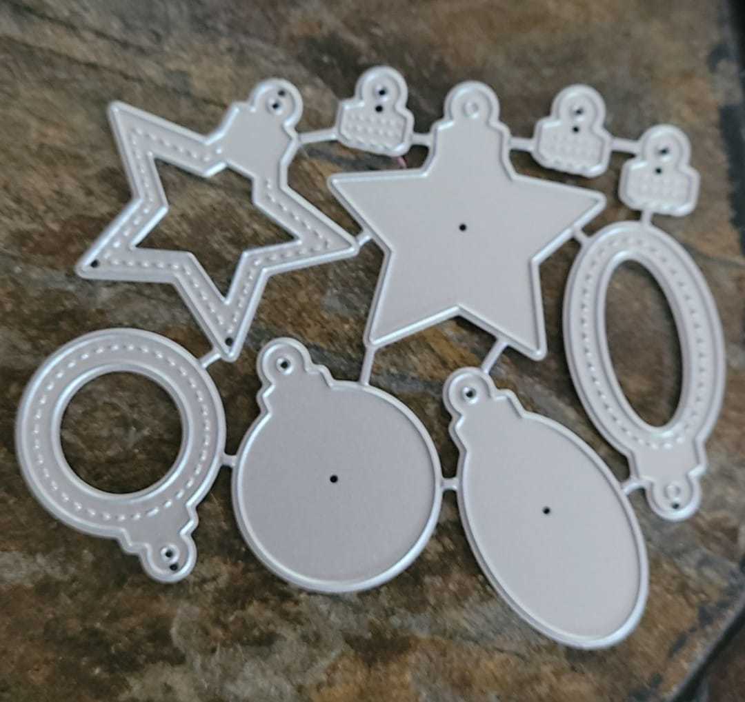 9 Piece ornament metal cutting die set.  - $10.00
