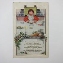 Christmas Postcard Boy Eats Holiday Dinner Candle Holly Embossed Whitney Antique - $5.99