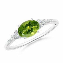 ANGARA 7x5mm Natural Peridot Solitaire Ring with Trio Diamond Accents in Silver - £268.34 GBP+