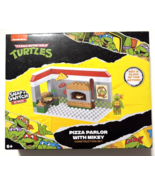Teenage Mutant Ninja Turtles Pizza Parlor With Mikey Construction Set - $245.65 MXN