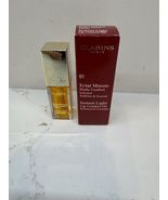 Clarins Instant Light Lip Comfort Oil #01 Honey .1 OZ NIB - $257.07 MXN