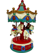 Avon SANTA&#39;S CAROLING CAROUSEL Spins Music Box Plays 20 Christmas Songs ... - $23.47