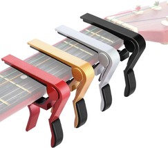 4 Pcs\. Guitar Capo Aluminum Metal Universal, Acoustic And Classical, Gold). - $19.98