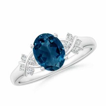 Authenticity Guarantee 
ANGARA Oval London Blue Topaz Criss Cross Ring with D... - £820.63 GBP