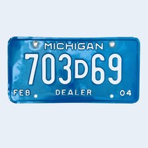 2004 United States Michigan Base Dealer License Plate 703D69 - £13.29 GBP