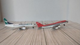 Set of 2 Damaged Diecast Airplanes - WestJet and Northwest Airlines -1:400 - £27.58 GBP